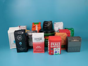 a lineup of decaf coffee bags from a variety of roasters